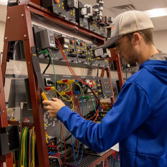 Student working with wires