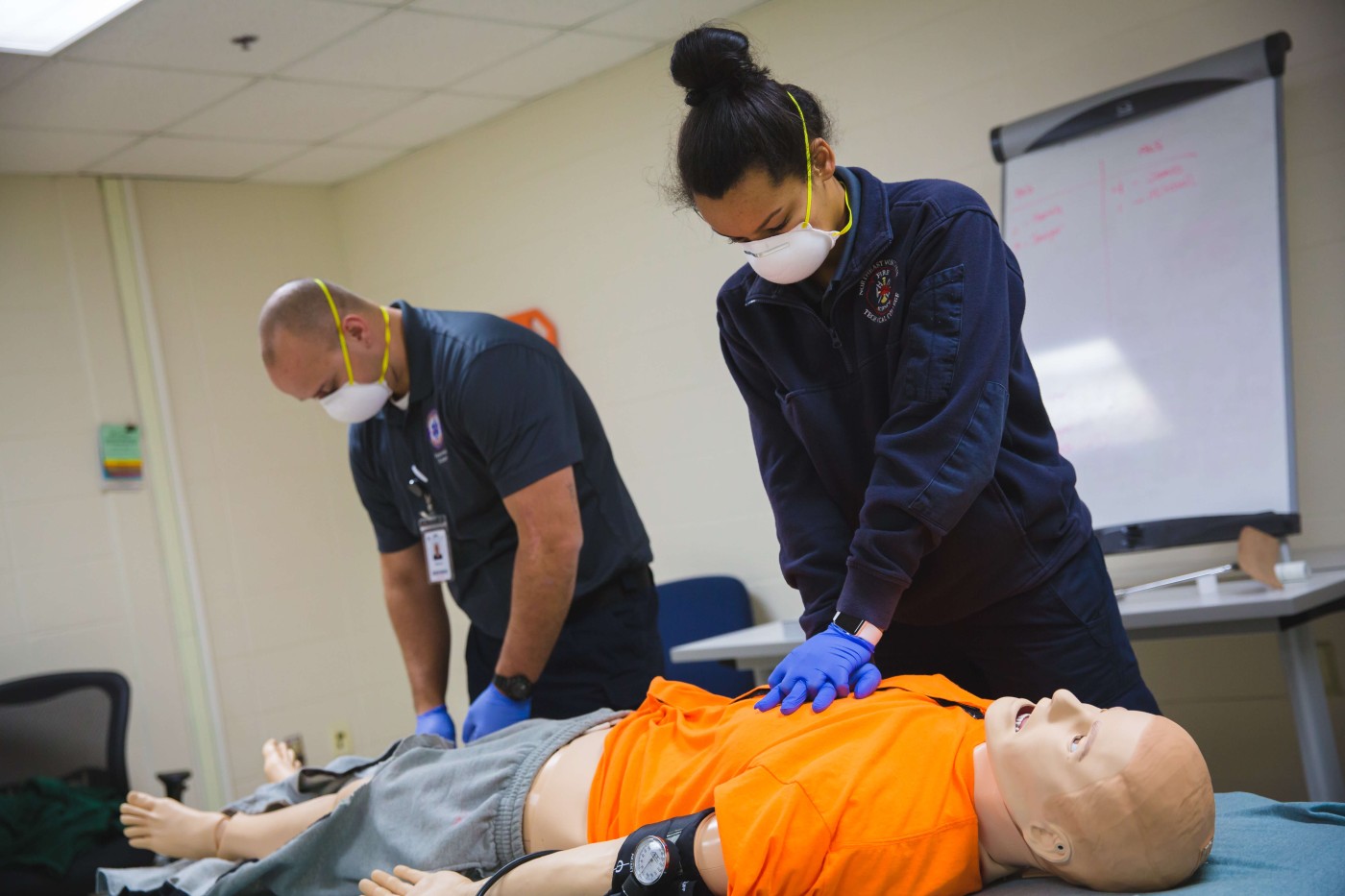 EMTs working on a simulated patient 