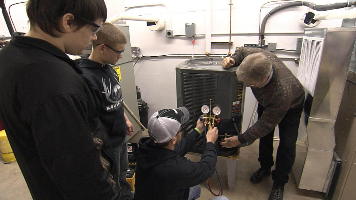 HVAC students measuring pressure