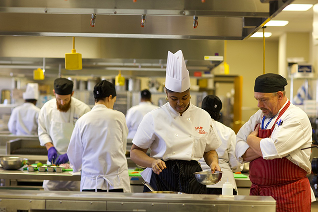 Chef is supervising the work of the student 