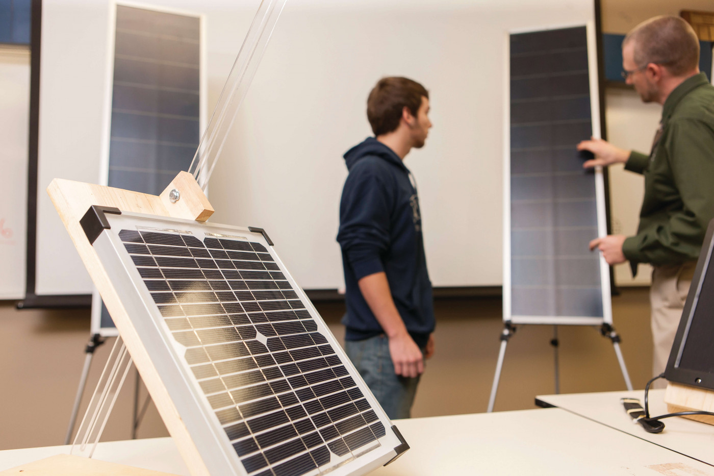 Students with solar energy panel